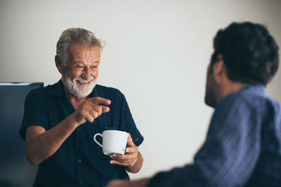 Man and coffee cup