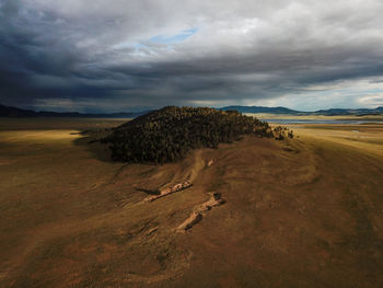 Scenic view of land against sky