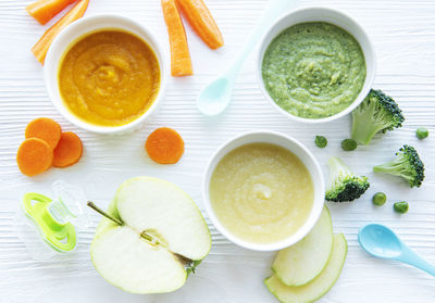 Baby food, assortment of fruit and vegetable puree, flat lay, top view