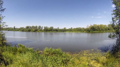 Scenic view of lake against clear sky