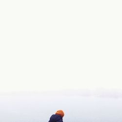 Silhouette of person standing on road