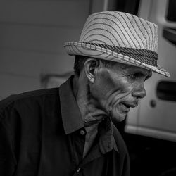 Close-up portrait of man wearing hat