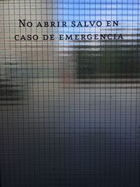 Full frame shot of text on fence