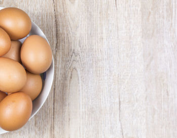 High angle view of eggs in container on table