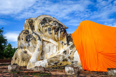 Low angle view of statue against sky