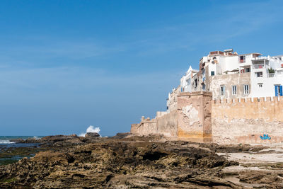 Blue sky, spindrift and the medina of essaouira, morocco