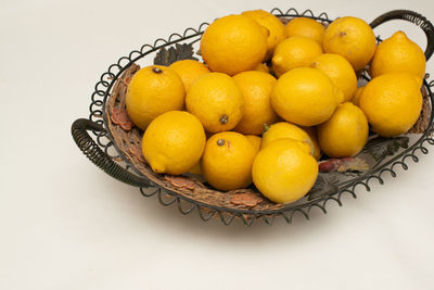 High angle view of oranges in basket