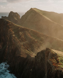 Panoramic view of mountain range against sky