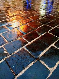 High angle view of wet footpath