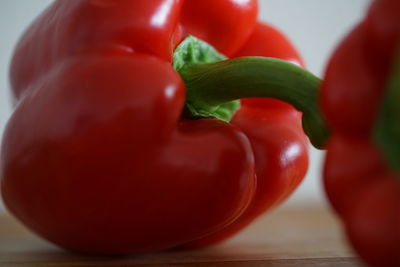 Close-up of red bell peppers on table