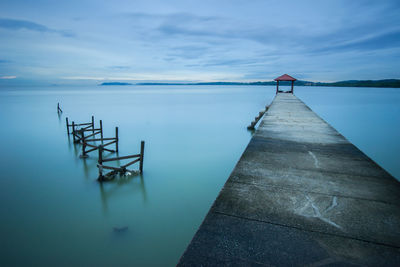 View of calm sea against blue sky