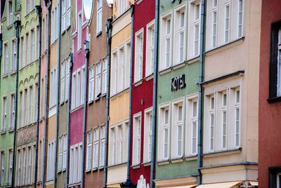 Historic multi colored facades of houses in a row in gdansk old town, poland