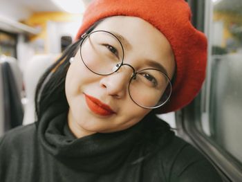 Close-up portrait of smiling young man