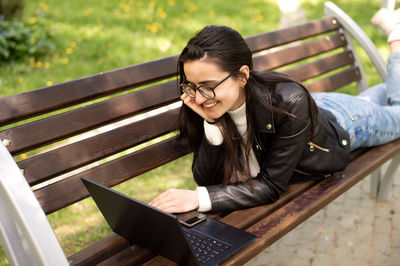 Young woman using mobile phone