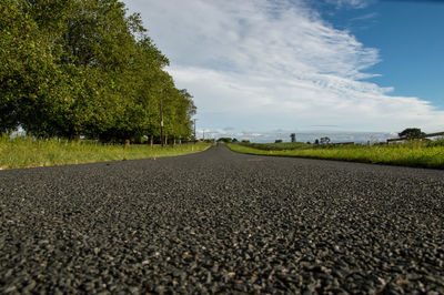 Surface level of road against sky