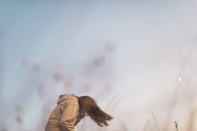 Portrait of a young woman on a sunny day in autumn