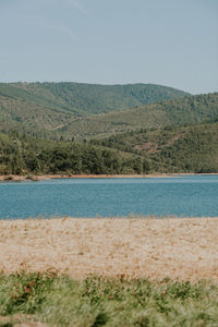 Scenic view of lake against sky