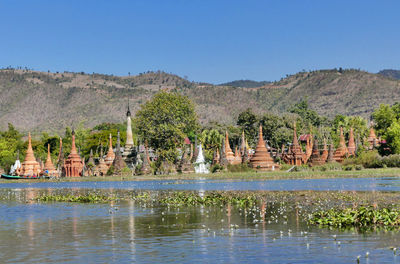 Scenic view of lake against blue sky