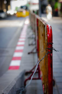 Red umbrella on street in city