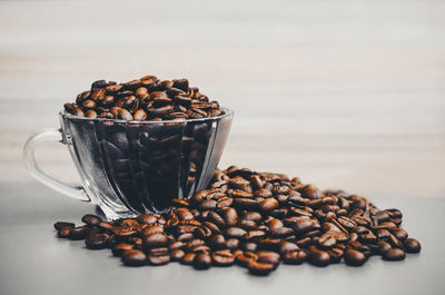 Close-up of coffee beans on table