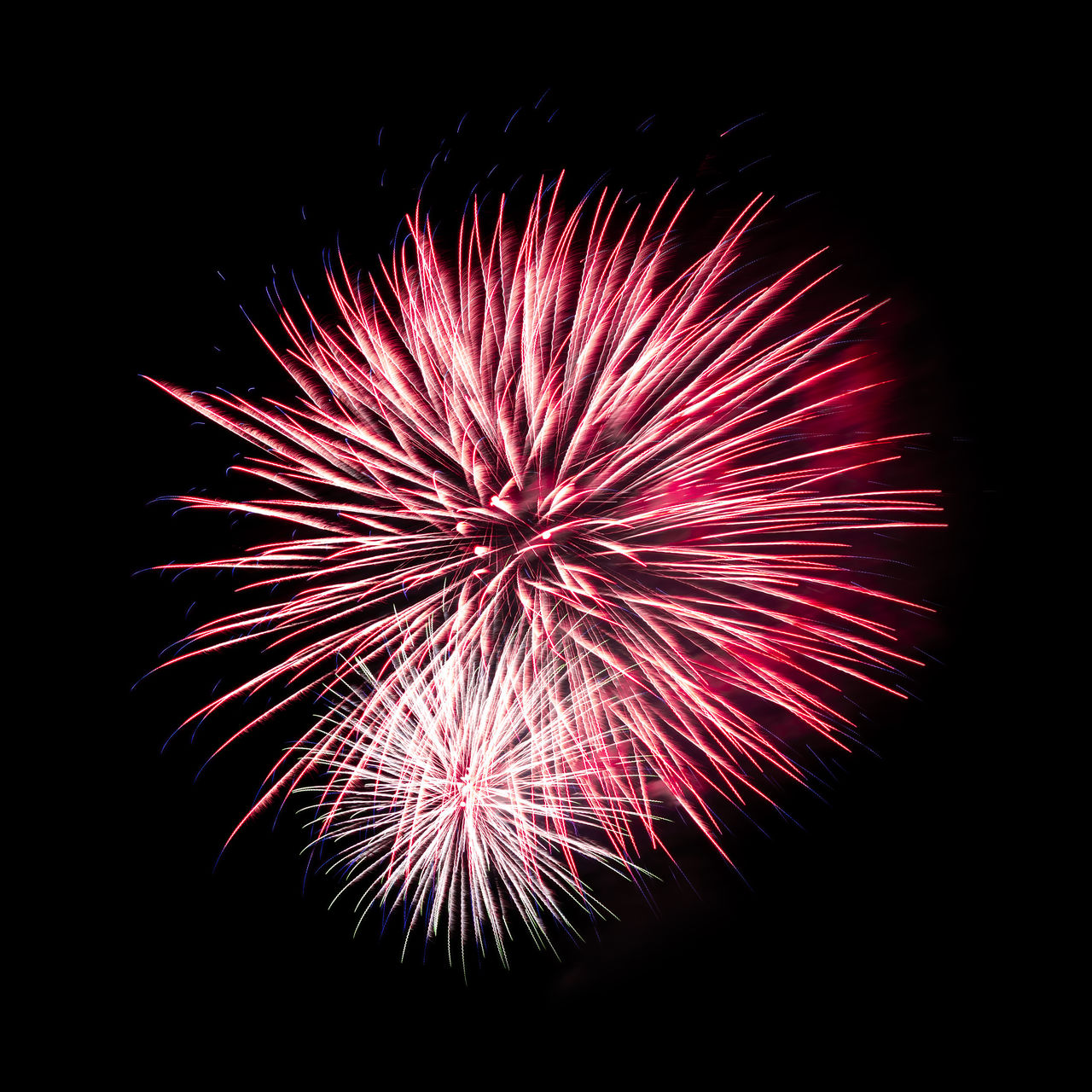 fireworks, firework display, celebration, exploding, motion, event, night, illuminated, arts culture and entertainment, recreation, no people, glowing, firework - man made object, sky, nature, multi colored, red, blurred motion, long exposure, black, low angle view, dark, outdoors, new year's eve