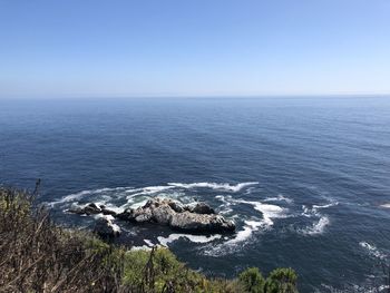 Scenic view of sea against clear sky