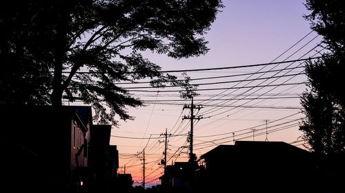 Low angle view of electricity pylon