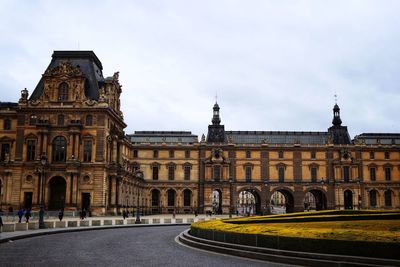 View of buildings in city against sky