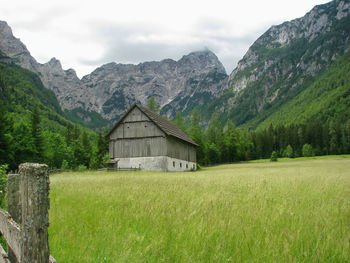 Scenic view of landscape and mountains against sky