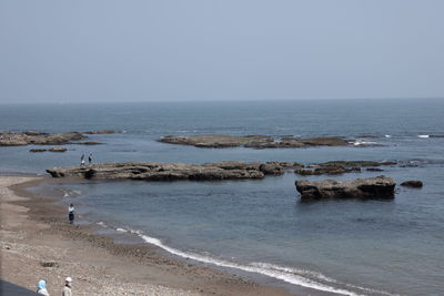 Scenic view of sea against clear sky