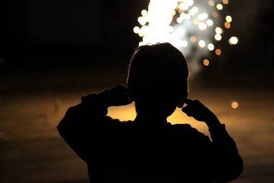 Woman looking at night