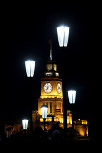 Illuminated street light at night