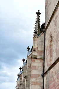 Low angle view of old building against sky