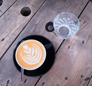 High angle view of cappuccino on table