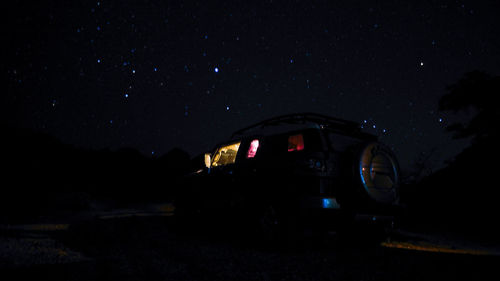 Car against sky at night