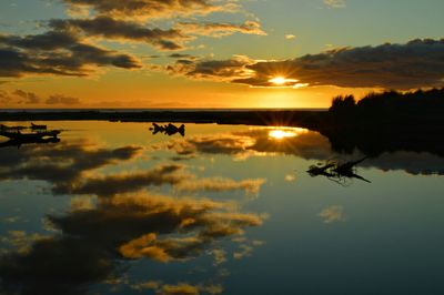 Scenic view of sea at sunset