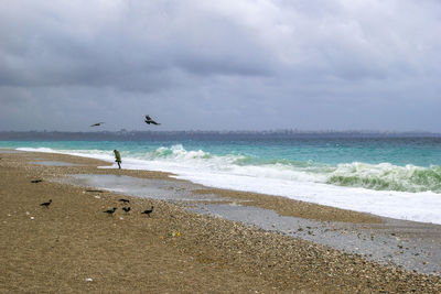 Scenic view of beach against sky