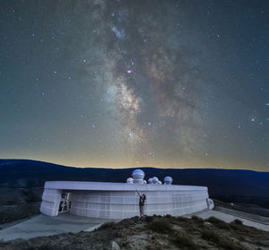 Scenic view of sea against sky at night