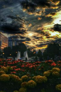 Cityscape against cloudy sky