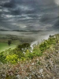 Scenic view of sea against cloudy sky