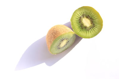 Close-up of fruit against white background