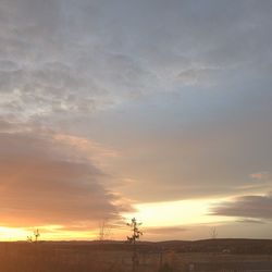 Scenic view of landscape at sunset