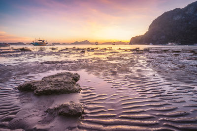 Scenic view of sea against sky during sunset