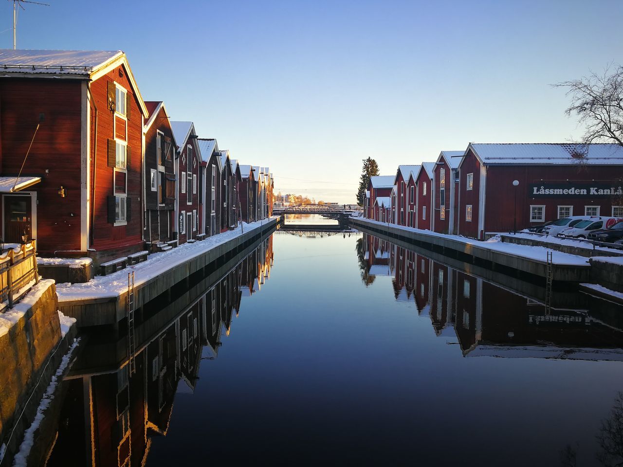 built structure, architecture, water, building exterior, reflection, outdoors, clear sky, waterfront, no people, day, nature, sky, travel destinations, nautical vessel