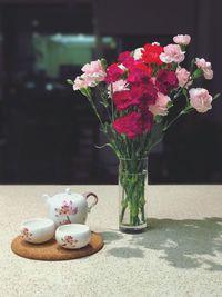 Close-up of flowers in vase on table