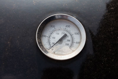 High angle view of information sign on metal