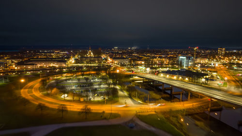 High angle view of illuminated city at night