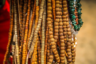 Close-up of vegetables hanging at market stall