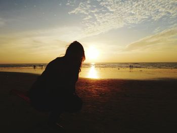 Scenic view of sea at sunset