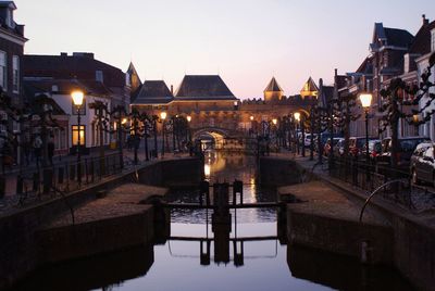 Reflection of illuminated buildings in water